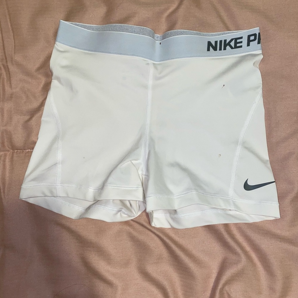 White Nike pro shorts